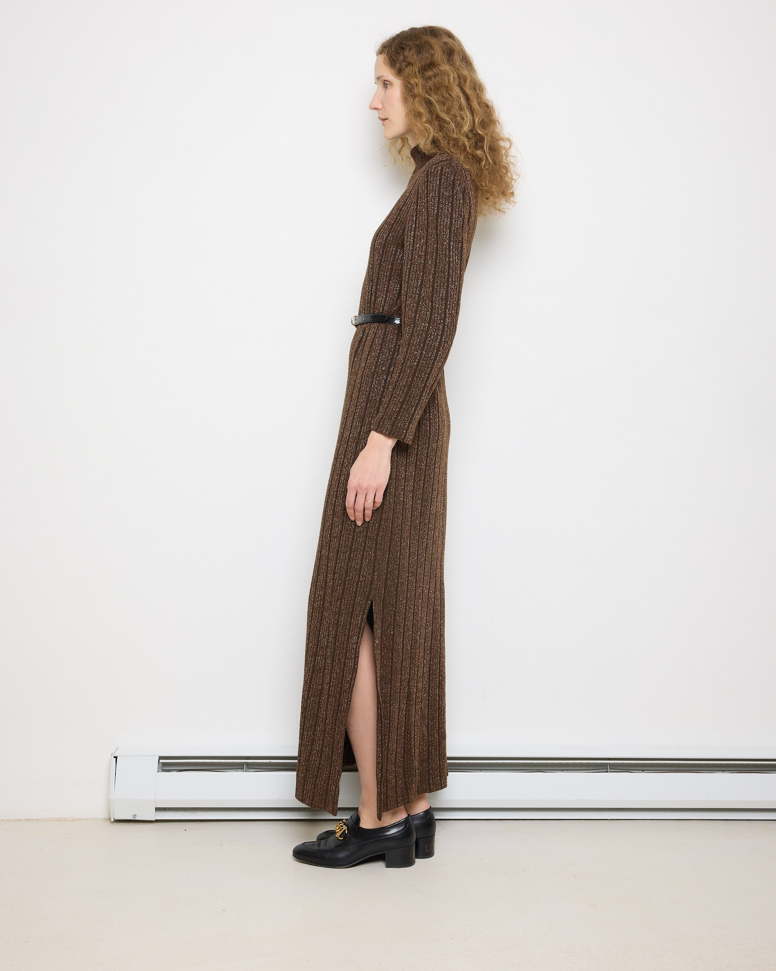 Francesca for Damon Dress, made in Italy, 15.5-inch shoulders, 58-inch length, 23-inch sleeves. Model is 5'11"