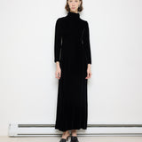 Vintage velvet long sleeve dress, 55-inch length, 15-inch shoulders, 22-inch sleeves. Model is 5'11"