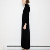 Vintage velvet long sleeve dress, 55-inch length, 15-inch shoulders, 22-inch sleeves. Model is 5'11"