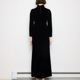 Vintage velvet long sleeve dress, 55-inch length, 15-inch shoulders, 22-inch sleeves. Model is 5'11"