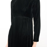 Vintage velvet long sleeve dress, 55-inch length, 15-inch shoulders, 22-inch sleeves. Model is 5'11"