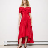 Vintage red dress with flower detail, 44-55 inch length, 16.5-inch shoulders, fits like size 8. Model is 5'11"
