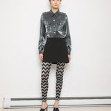 Vintage mini skirt, 14-inch length, 14.5-inch waist (laid flat). Model is 5'9", in excellent condition