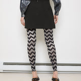 Vintage mini skirt, 14-inch length, 14.5-inch waist (laid flat). Model is 5'9", in excellent condition