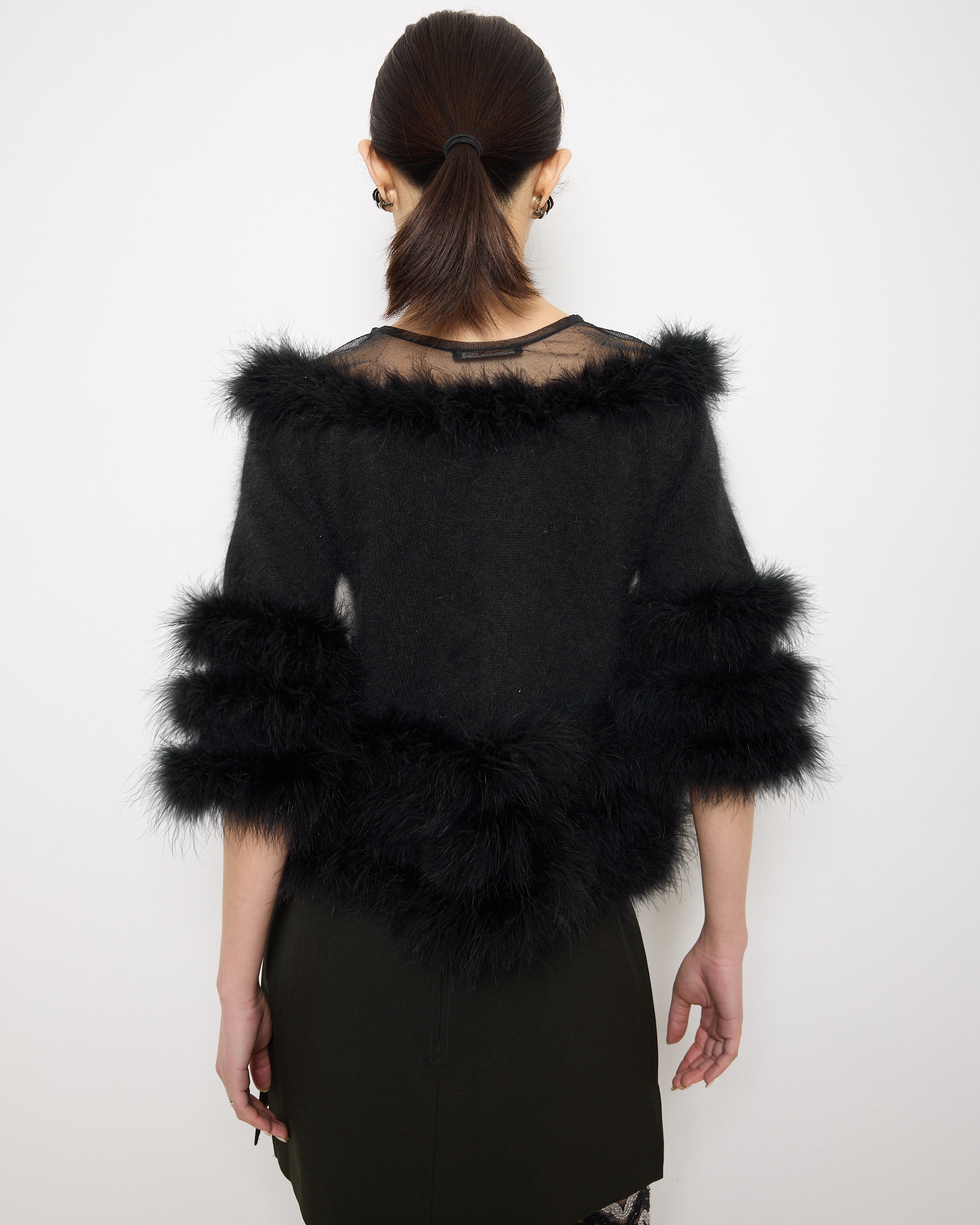 Purificación García Fur Coat, size S, 22-inch length, angora blend with 100% duck feather details. Model is 5'9"