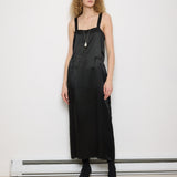 1920s Silk Black Dress, 54-inch length, 18-inch chest, 100% silk. Model is 5'11", very good vintage condition