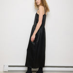 1920s Silk Black Dress, 54-inch length, 18-inch chest, 100% silk. Model is 5'11", very good vintage condition