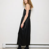 1920s Silk Black Dress, 54-inch length, 18-inch chest, 100% silk. Model is 5'11", very good vintage condition