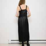 1920s Silk Black Dress, 54-inch length, 18-inch chest, 100% silk. Model is 5'11", very good vintage condition