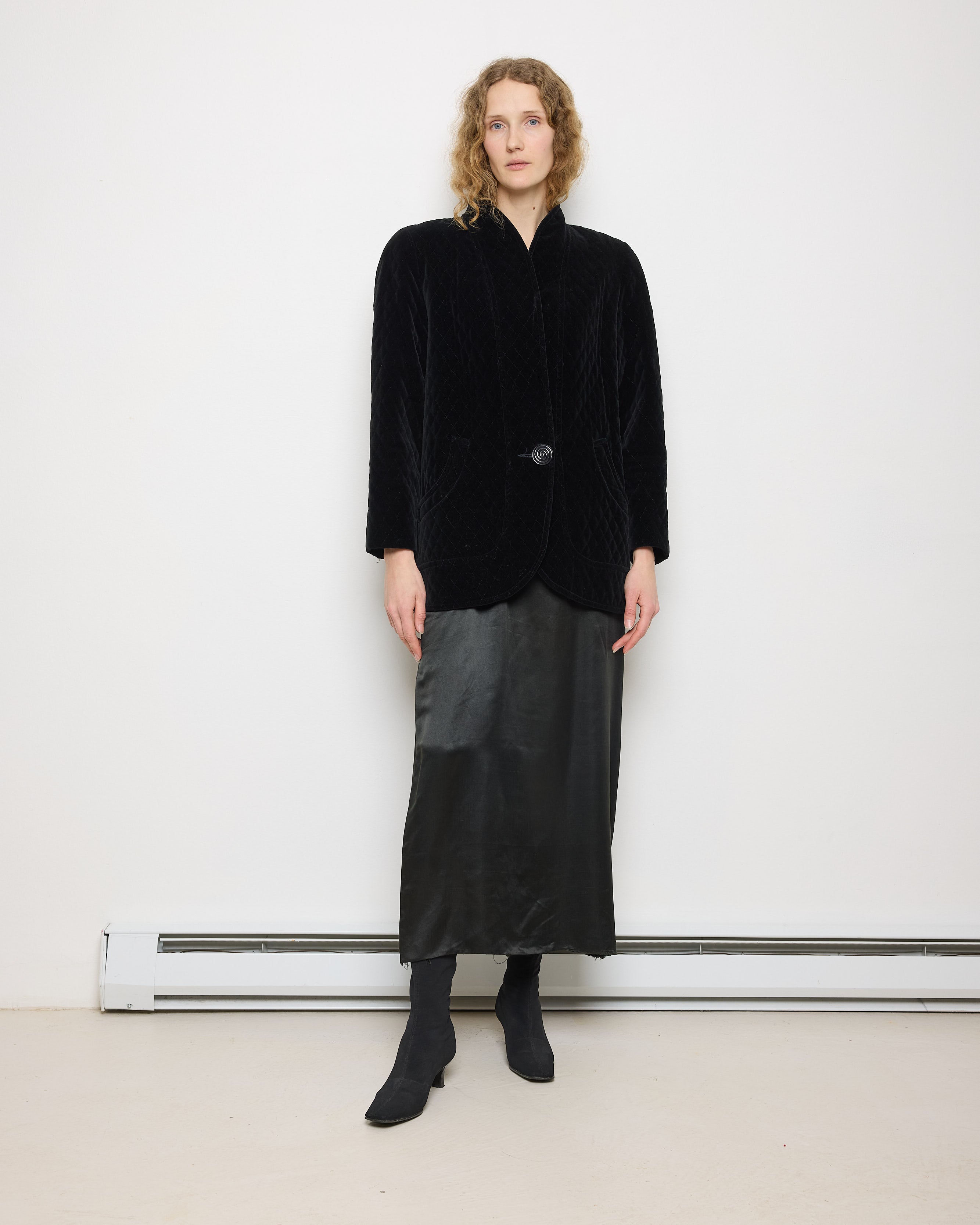 Black Quilted Velvet Blazer, size 12, 100% cotton, 28.5-inch length, 18-inch shoulders, 22-inch sleeves. Model is 5'11"