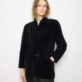 Black Quilted Velvet Blazer, size 12, 100% cotton, 28.5-inch length, 18-inch shoulders, 22-inch sleeves. Model is 5'11"