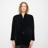Black Quilted Velvet Blazer, size 12, 100% cotton, 28.5-inch length, 18-inch shoulders, 22-inch sleeves. Model is 5'11"