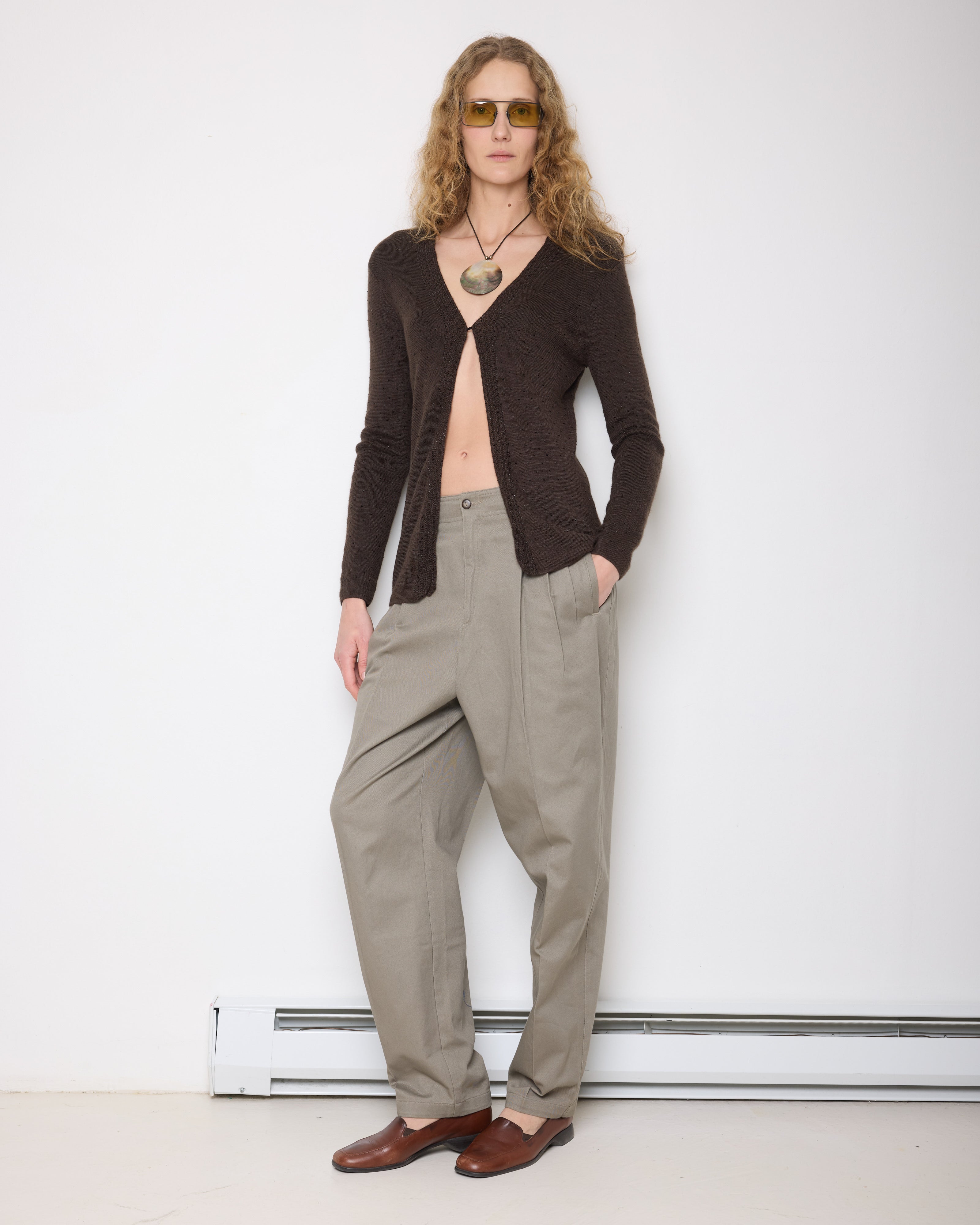 Discover the LizSport Pants – a 42.5-inch, 100% cotton pant in very good condition. Size 14, featuring a 16-inch waist (laid flat) for a relaxed fit. Modeled by someone 5'11" tall.