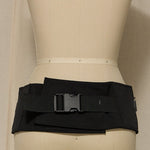 Black belt on a mannequin against a neutral background