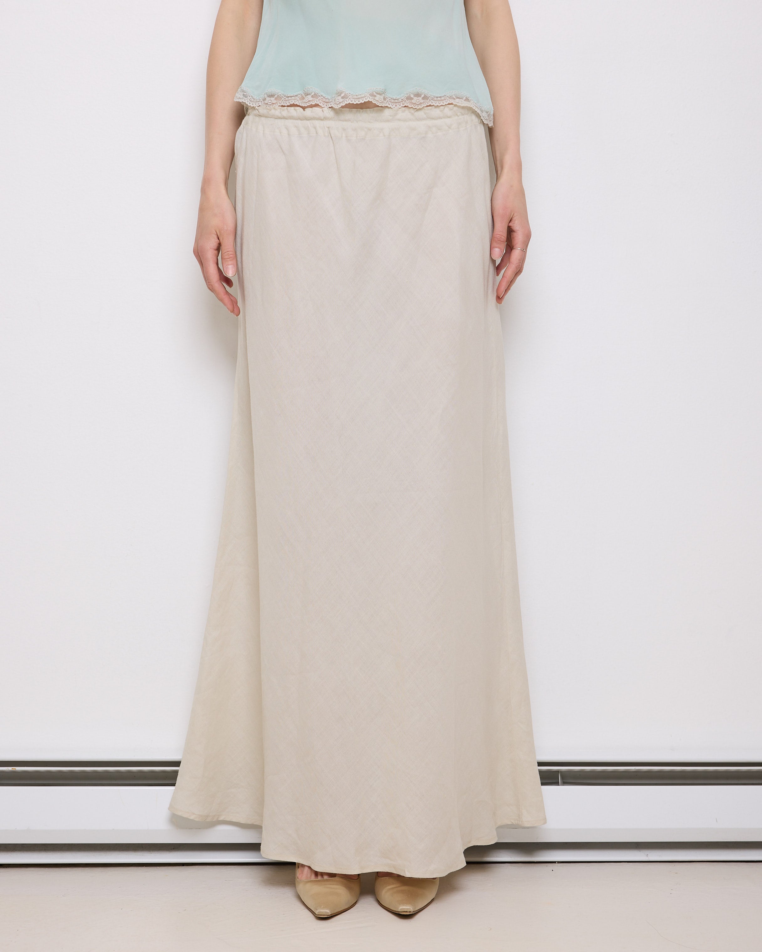 Vintage White Linen Skirt, 42-inch length, 16-inch waist, suggested size M/L. Model is 5'11"