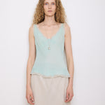 Green Silk Top, 23-inch length, suggested medium size. Model is 5'11", in good vintage condition