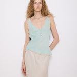 Green Silk Top, 23-inch length, suggested medium size. Model is 5'11", in good vintage condition