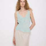 Green Silk Top, 23-inch length, suggested medium size. Model is 5'11", in good vintage condition