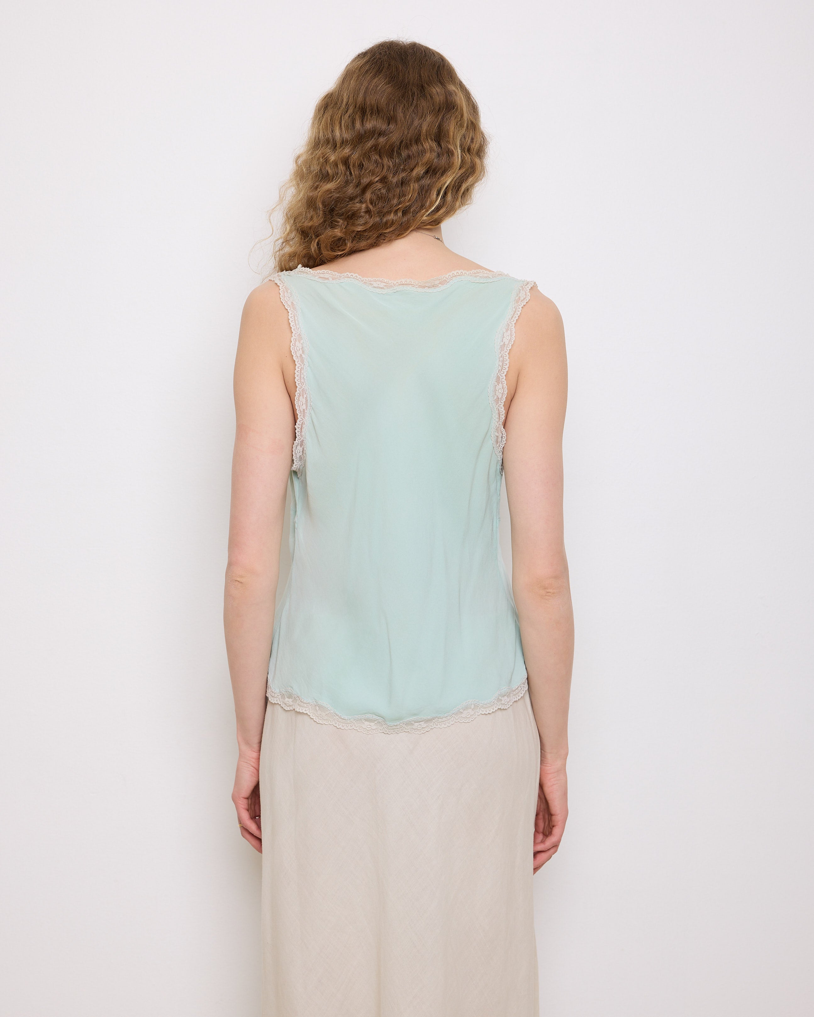 Green Silk Top, 23-inch length, suggested medium size. Model is 5'11", in good vintage condition