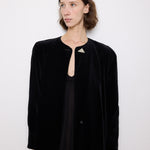 Vintage black velvet coat, 60-inch length, 24-inch sleeves, 16-inch shoulders, 100% cotton velvet