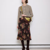 Brown leather shoulder bag with gold mesh details, 7x19 inches, 17-inch strap, multi-pocket design