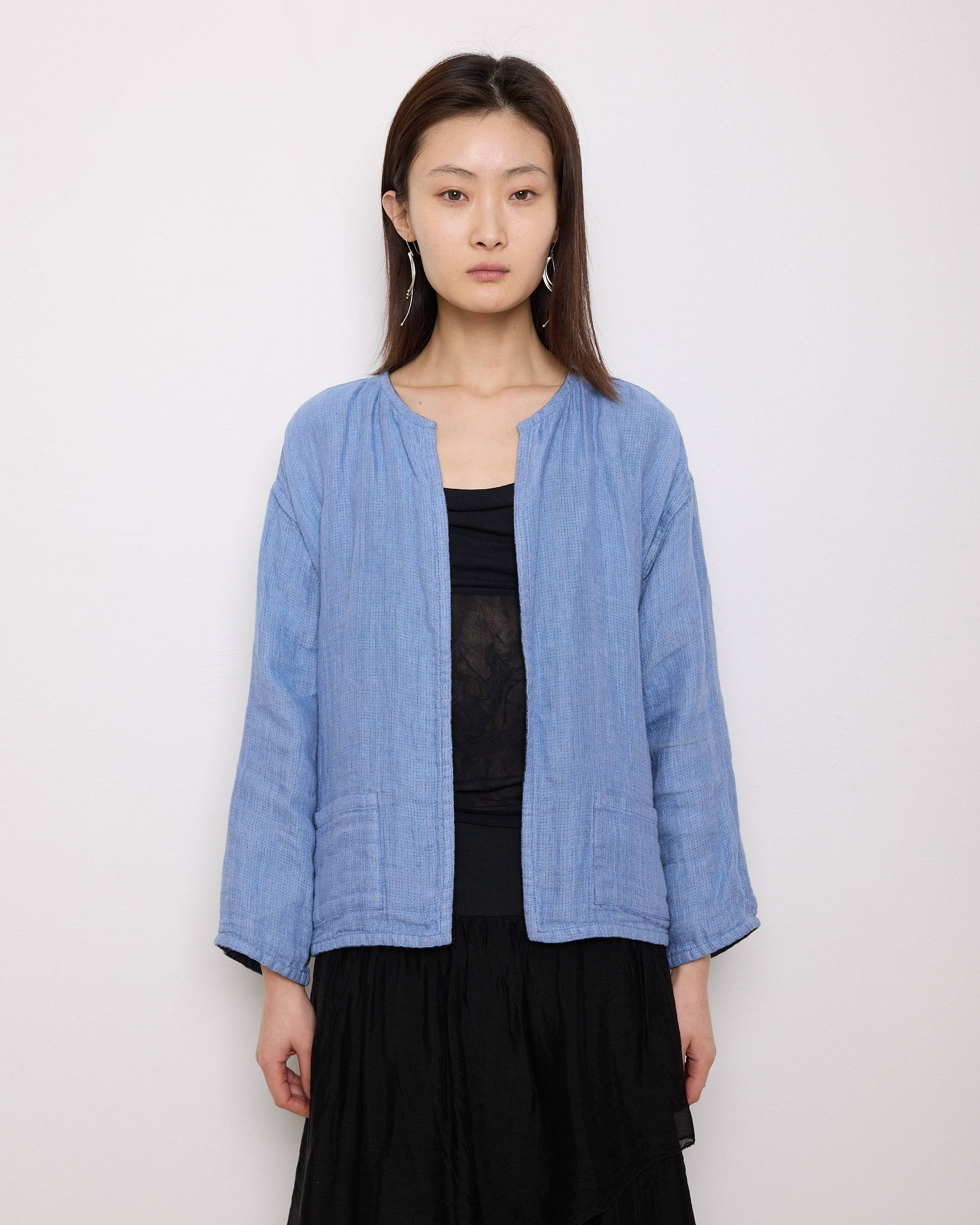 Reversible Blue Jacket, 22-inch length, 22-inch sleeves, 17-inch shoulders. Suggested size S–M. Good vintage condition