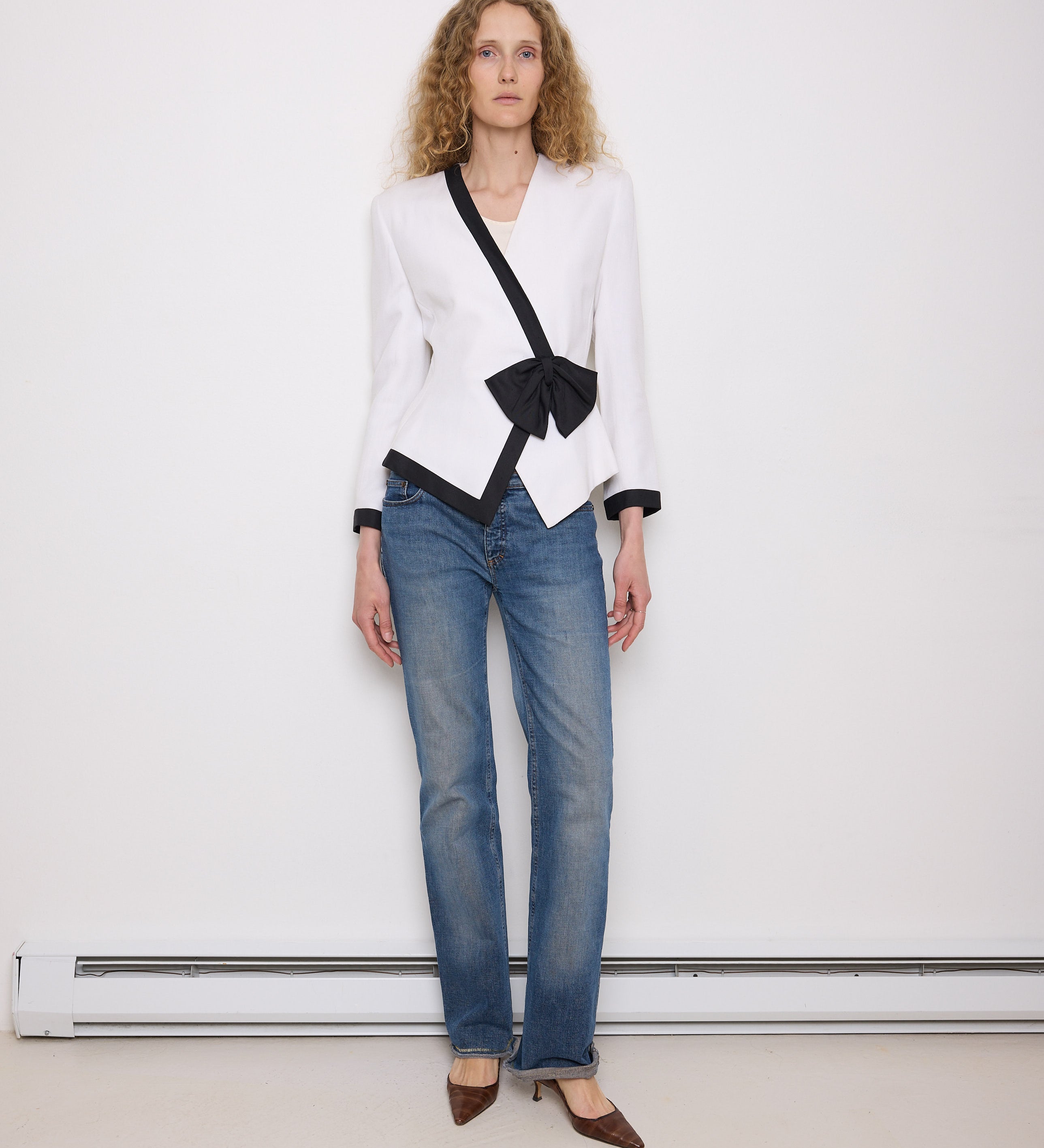 White vintage blazer with black trim and bow, 26.5” long, size 6, cotton-linen feel, very good condition