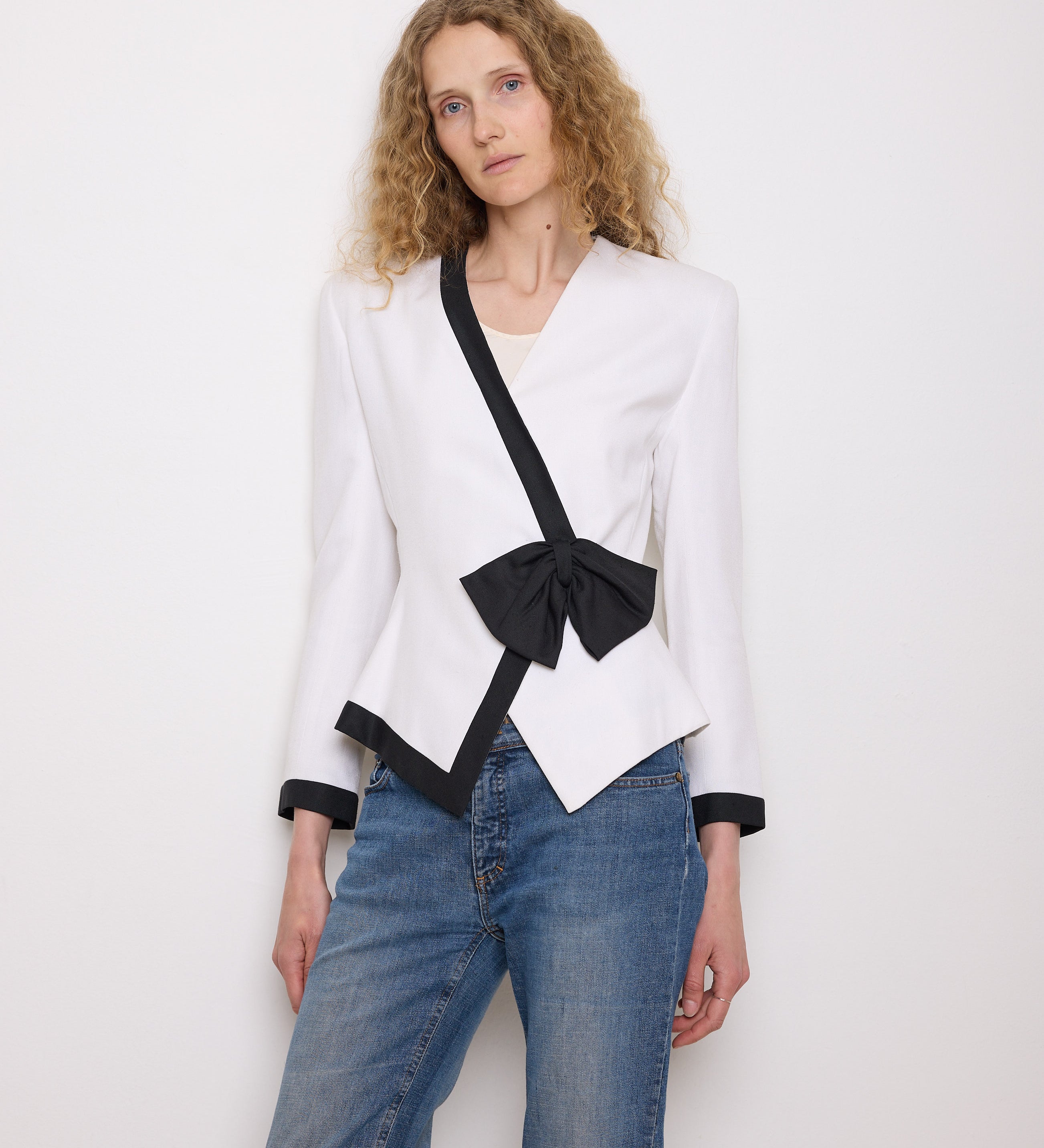 White vintage blazer with black trim and bow, 26.5” long, size 6, cotton-linen feel, very good condition