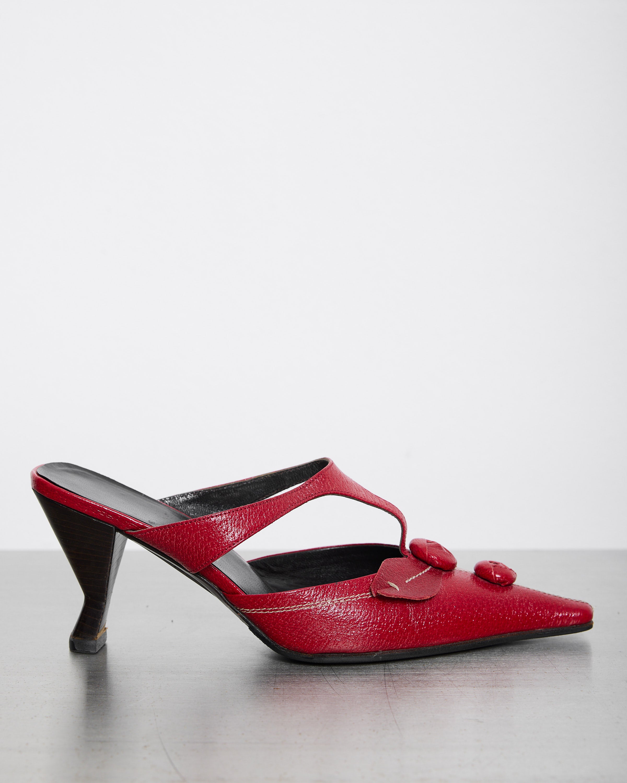 Discover the Prada Red Shoes – size 38 luxury designer footwear, featuring a sleek silhouette and bold red hue. In good condition, with some signs of wear.
