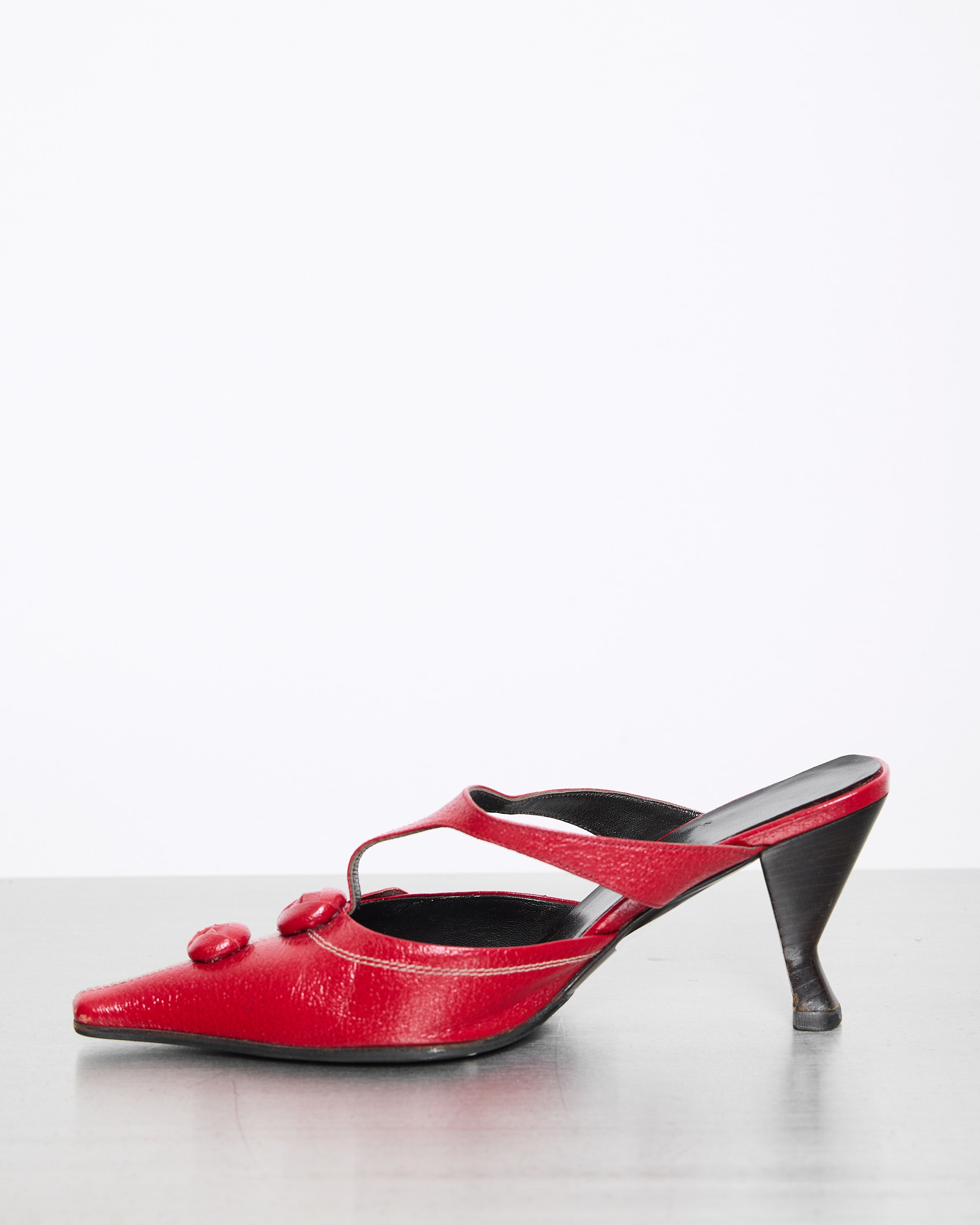 Prada Red Shoes in good condition with some signs of wear, size 38, featuring a timeless and elegant design