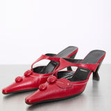 Prada Red Shoes in good condition with some signs of wear, size 38, featuring a timeless and elegant design