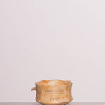 Discover the Grandmother’s Kitchen Soy Candle, a 4-inch ceramic soy wax candle with warm apple, cinnamon, and caramel notes. Burns for 60 hours.